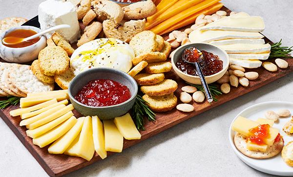 Cheese Board with Nuts, Jams, and Honey