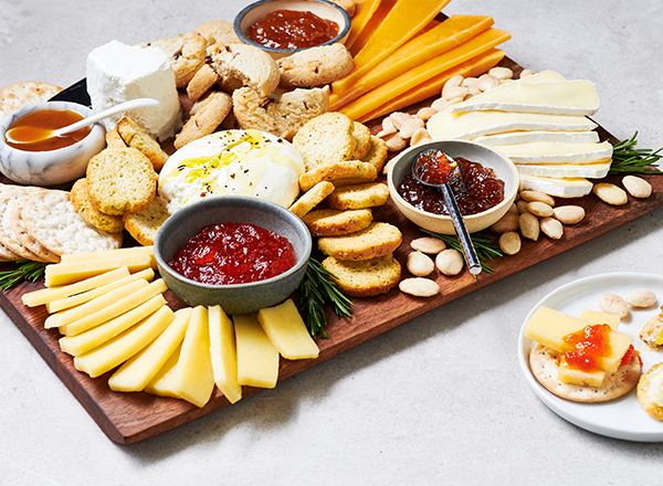 Cheese Board with Nuts, Jams, and Honey