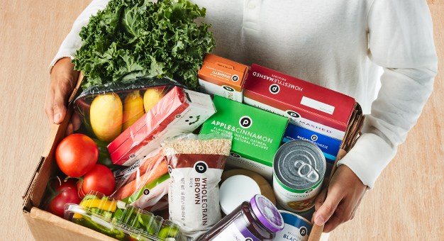 Image of box of products that go to the Feeding More Together program