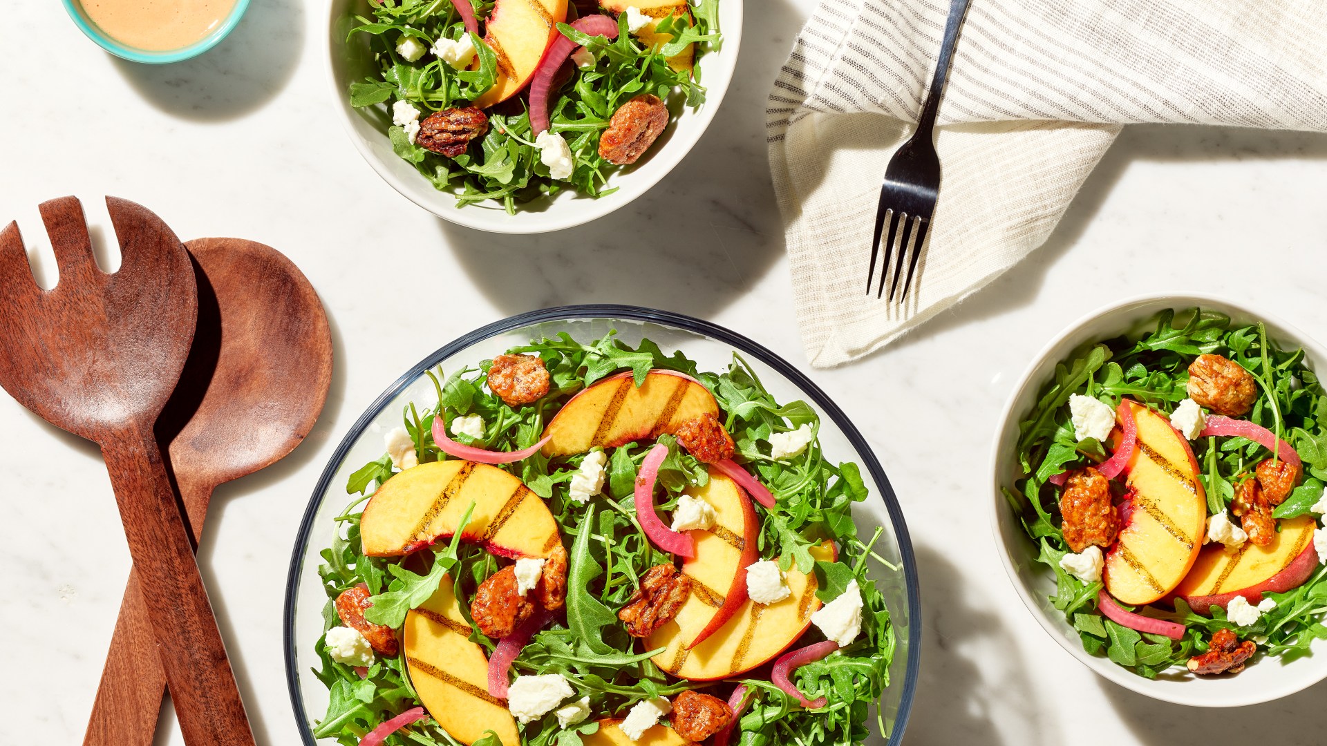 Peaches & Praline Summer Salad with Lemon Dijon Raspberry Vinaigrette