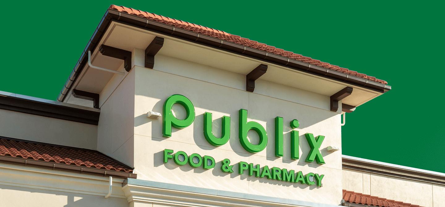 Publix Food & Pharmacy Storefront with a green sky background