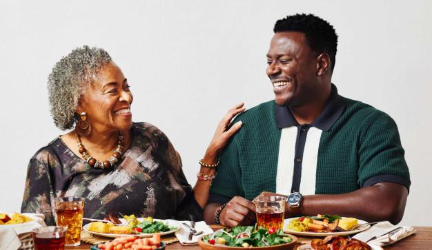 Father and mother gathered around sunday dinner