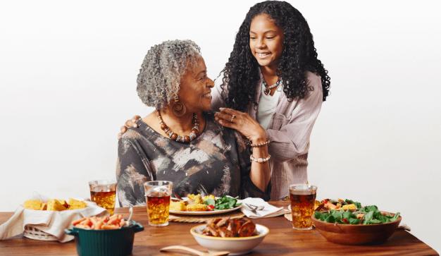 Grandmother and granddaughter gathered for sunday dinner