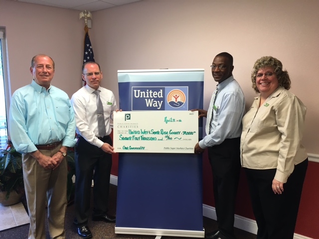 publix charities check presentation to united way of santa rosa county