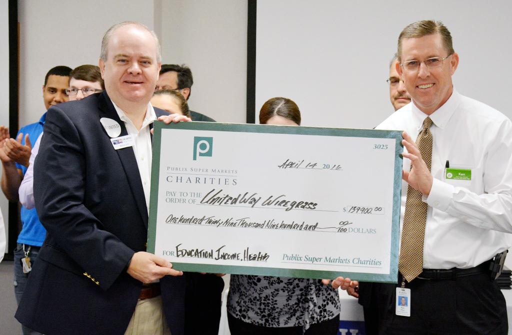 publix charities check presentation to united way of wiregrass