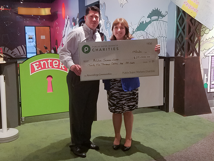 publix charities check presentation to McWane Science Center