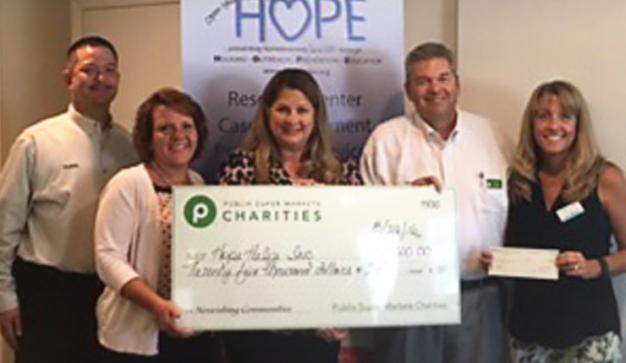 publix charities check presentation to hope helps