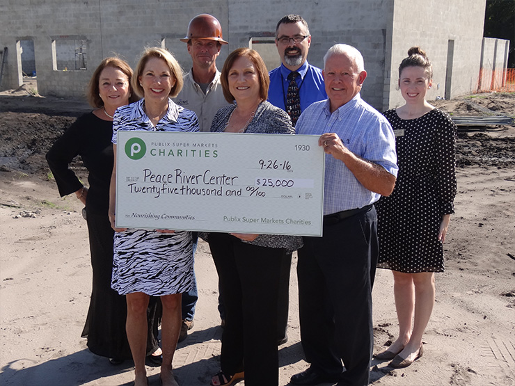 public charities check presentation to peace river center
