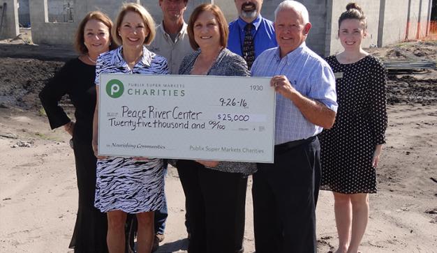 public charities check presentation to peace river center
