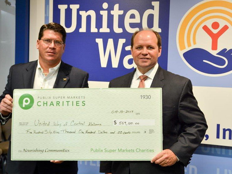 publix charities presents check to united way of central alabama