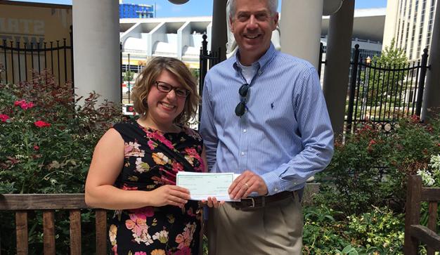 publix charities presents donation check to Nashville Symphony