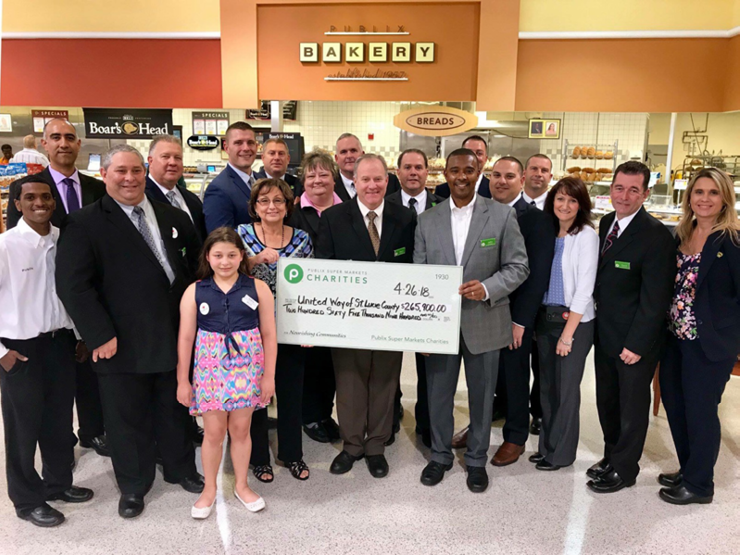 Publix Charities presents $265,900 donation check to United Way of St. Lucie County