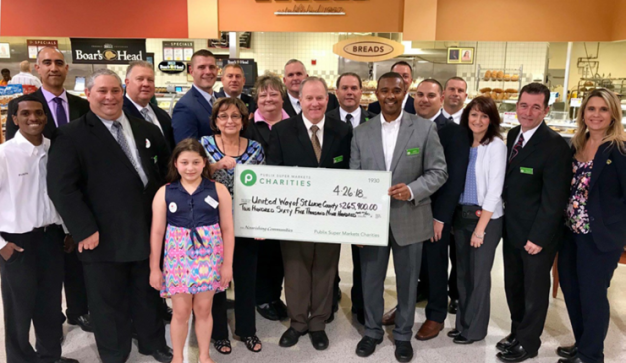 Publix Charities presents $265,900 donation check to United Way of St. Lucie County