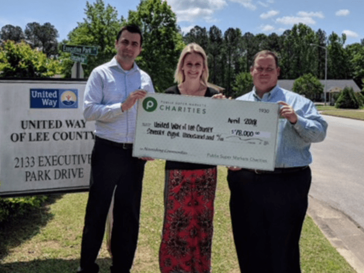 Publix Charities presents $78,000 donation check to United Way of Lee County