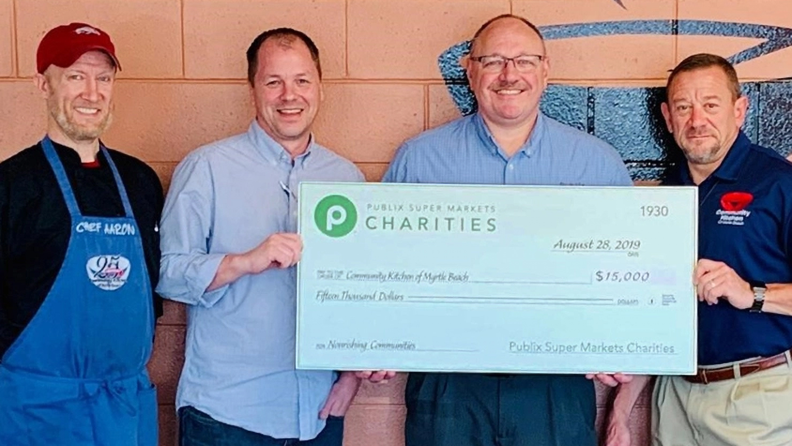 Community Kitchen of Myrtle Beach check presentation for $15,000.