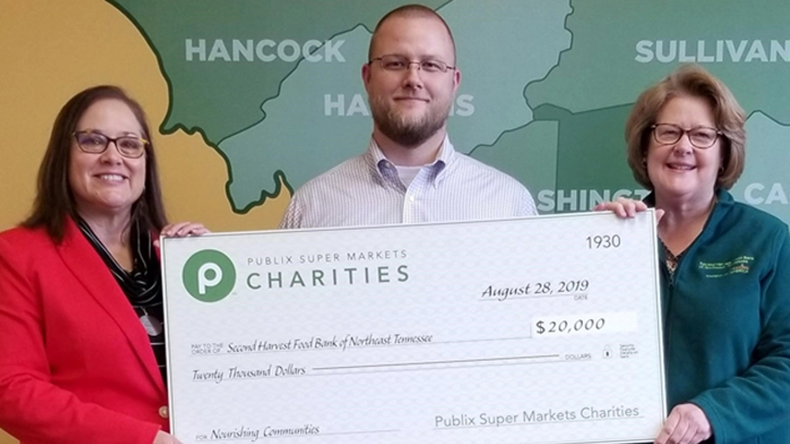 second harvest food bank of northeast tennessee check presentation for $20,000