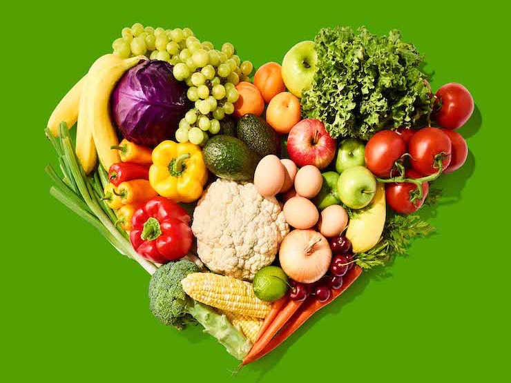 fresh donated food gathered in the shape of a heart