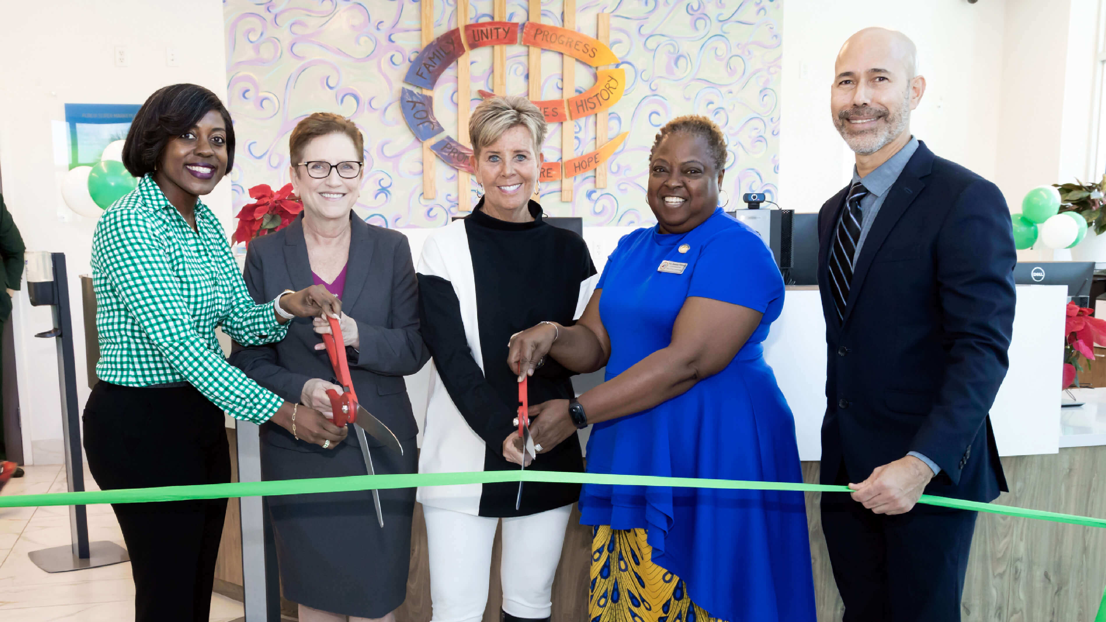 Cutting the ribbon: Robyn Hankerson-Printemps, community relations manager, Publix Super Markets, Inc., Miami Division; Kelly Williams-Puccio, executive director, Publix Super Markets Charities; YMCA of South Florida President and CEO Sheryl Woods; Fort Lauderdale City Commissioner Pamela Beasley-Pittman; and Gabe Ochoa, senior vice president, YMCA of South Florida.