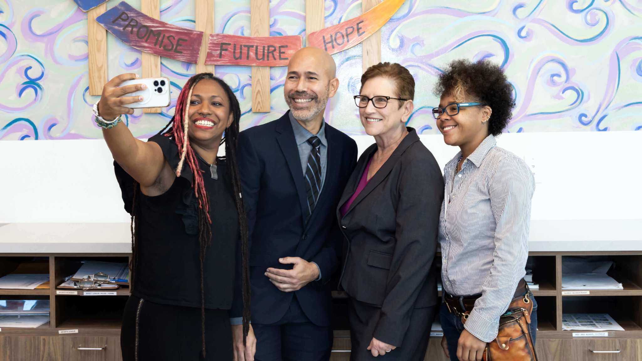 Niki Lopez, lead artist, project curator/manager/art director/designer and art director and designer, “I Have A Dream” Gallery and the Martin Luther King, Jr. recognition wall presented by Spirit Airlines at the Y at Sistrunk; Khaulah Naima Nuruddin, mixed media artist, Word Art Wall.