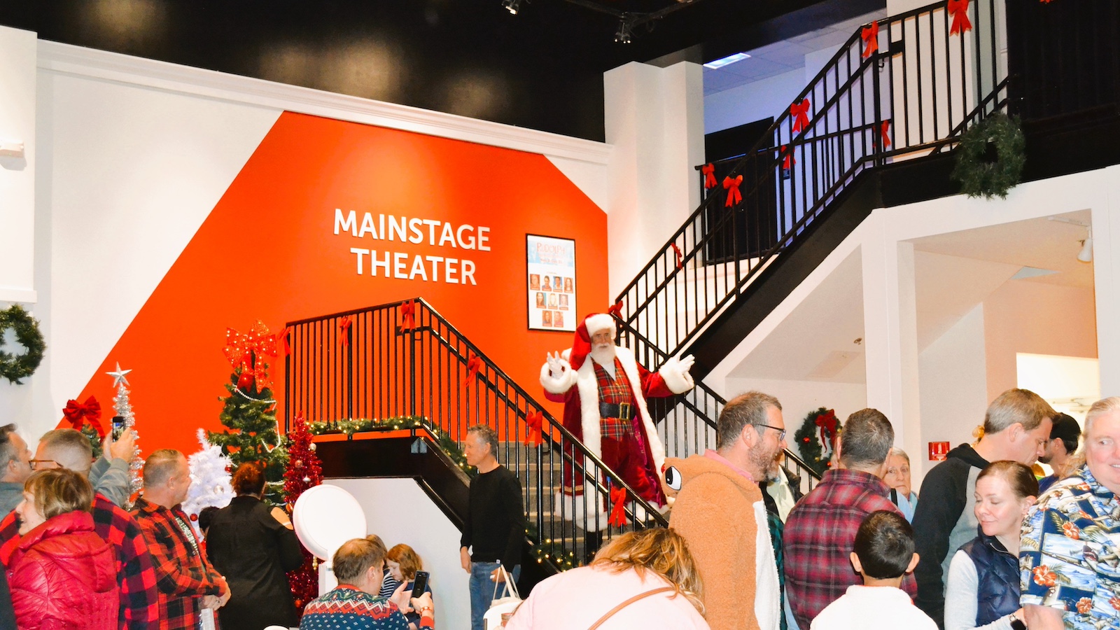 Santa waving at the mainstage theater