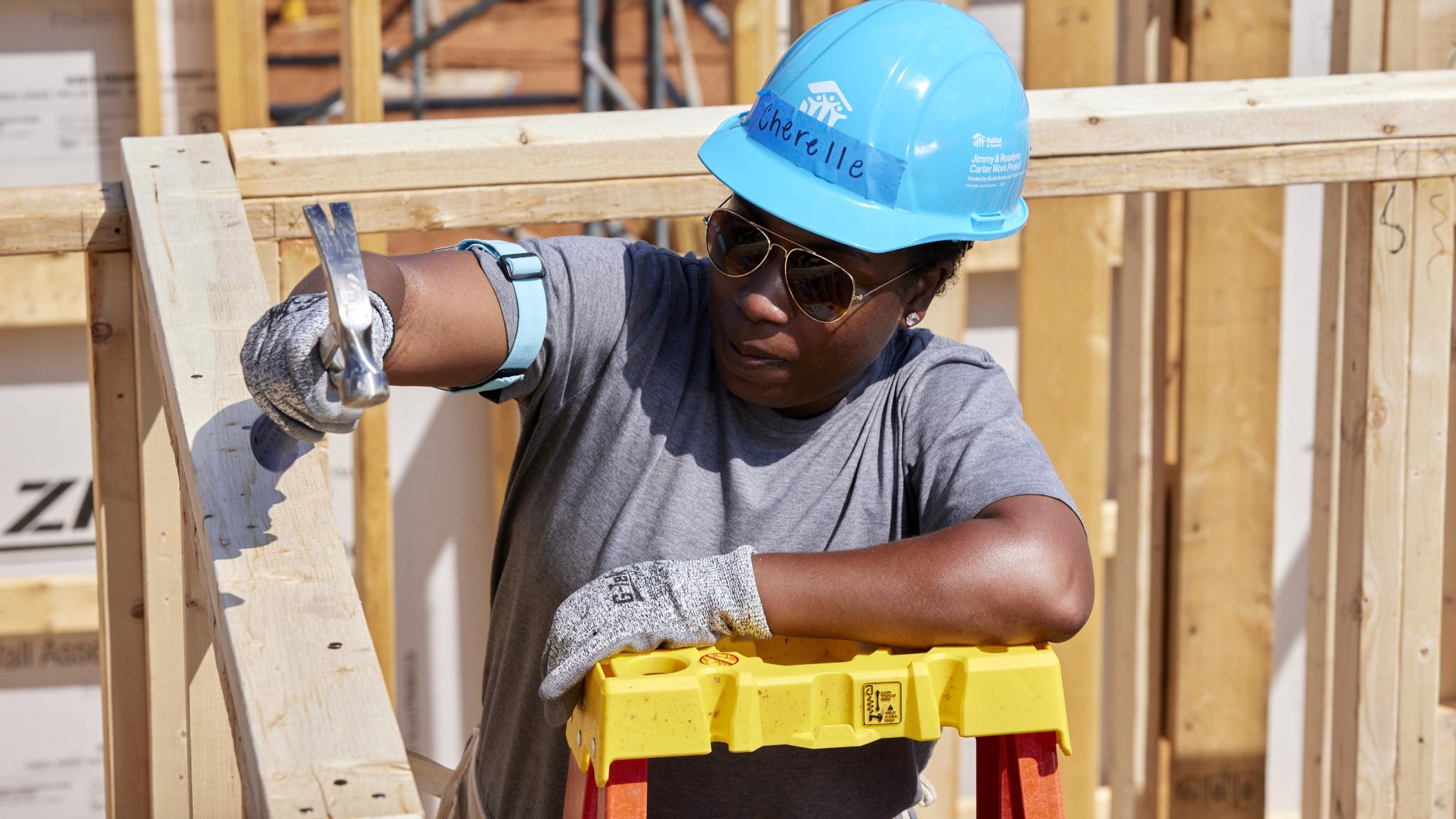 person working on a house
