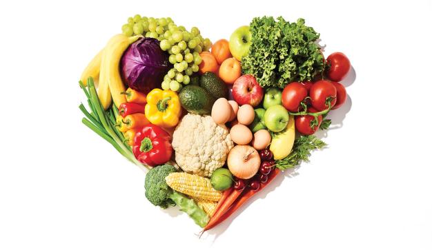 fresh donated food gathered in the shape of a heart