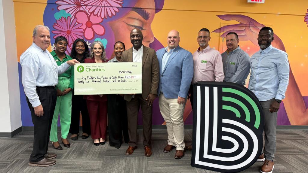 Publix Charities representatives present a $25,000 sponsorship check to Big Brothers Big Sisters of Miami staff members.
