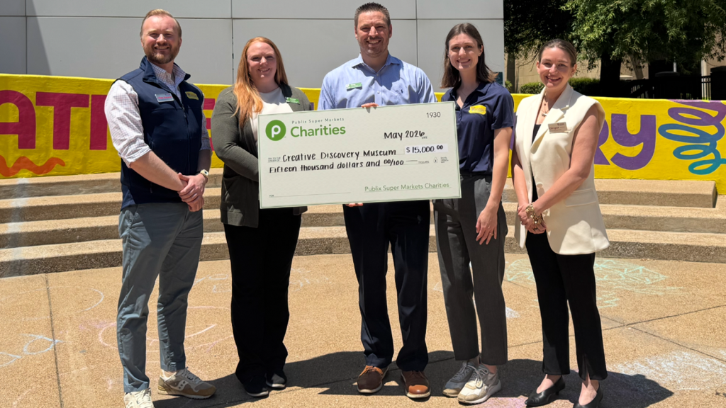 Publix Charities team members present a $15,000 donation check to Creative Discovery Museum representatives in Chattanooga, Tennessee.