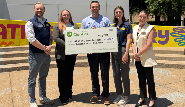 Publix Charities team members present a $15,000 donation check to Creative Discovery Museum representatives in Chattanooga, Tennessee.