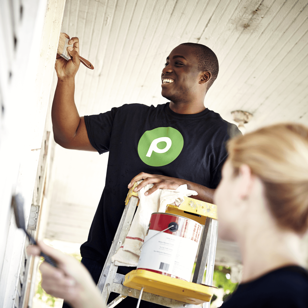 publix associate painting a house