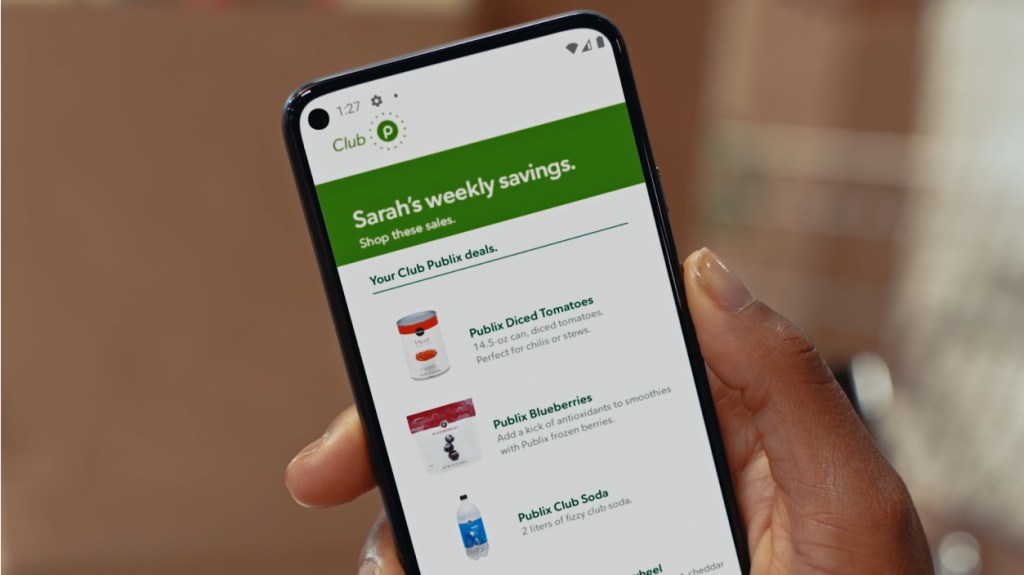 Phone with club publix offers on screen