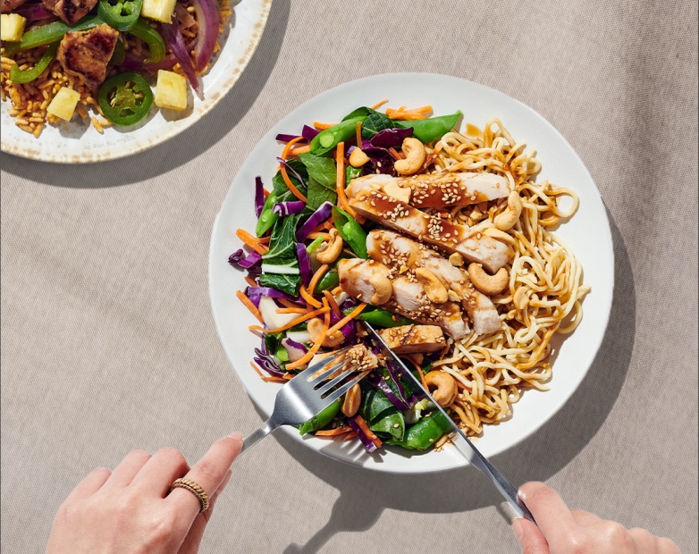 chicken, noodle, and salad meal