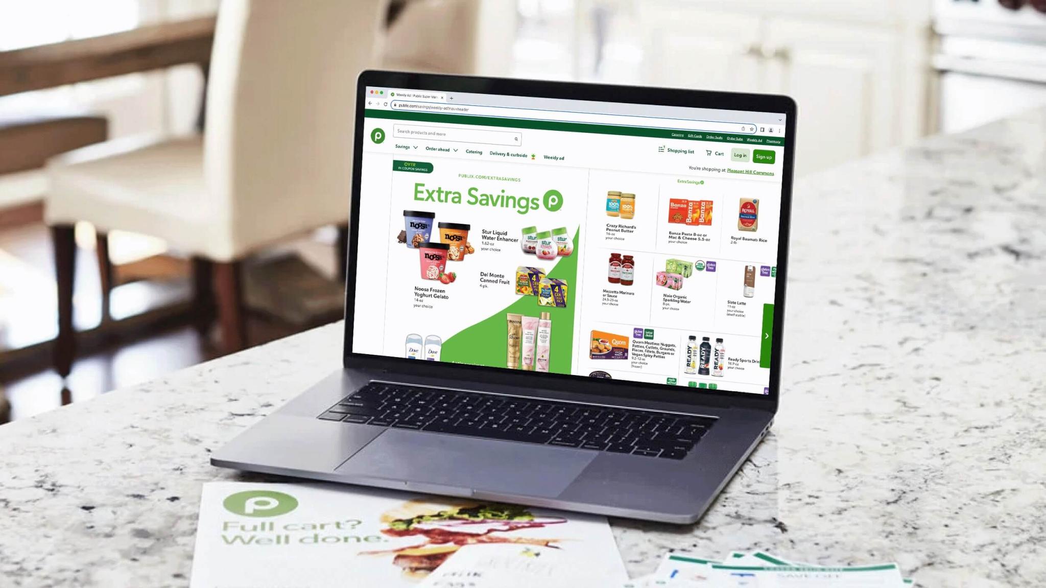 laptop screen showing publix extra savings ad