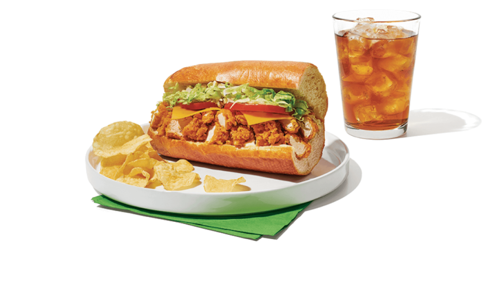 publix chicken tender sub on a plate with chips