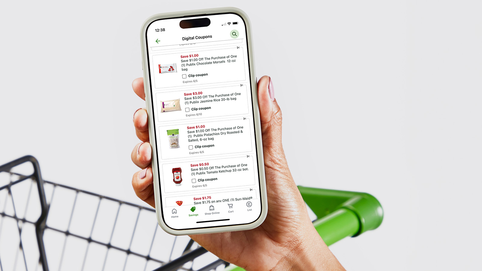 Hand holding an mobile phone with the Publix app digital coupons screen.