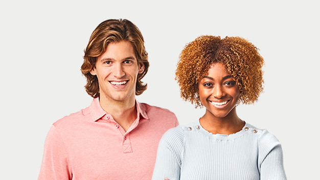 Man and woman in business casual clothes smiling