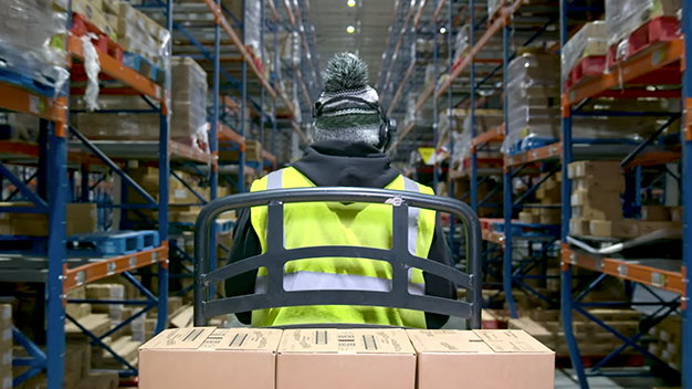 Publix Distribution Warehouse associate loading boxes