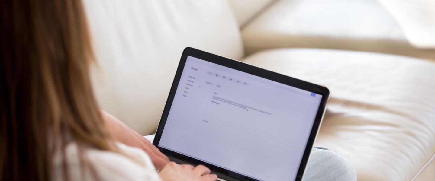 woman typing at computer