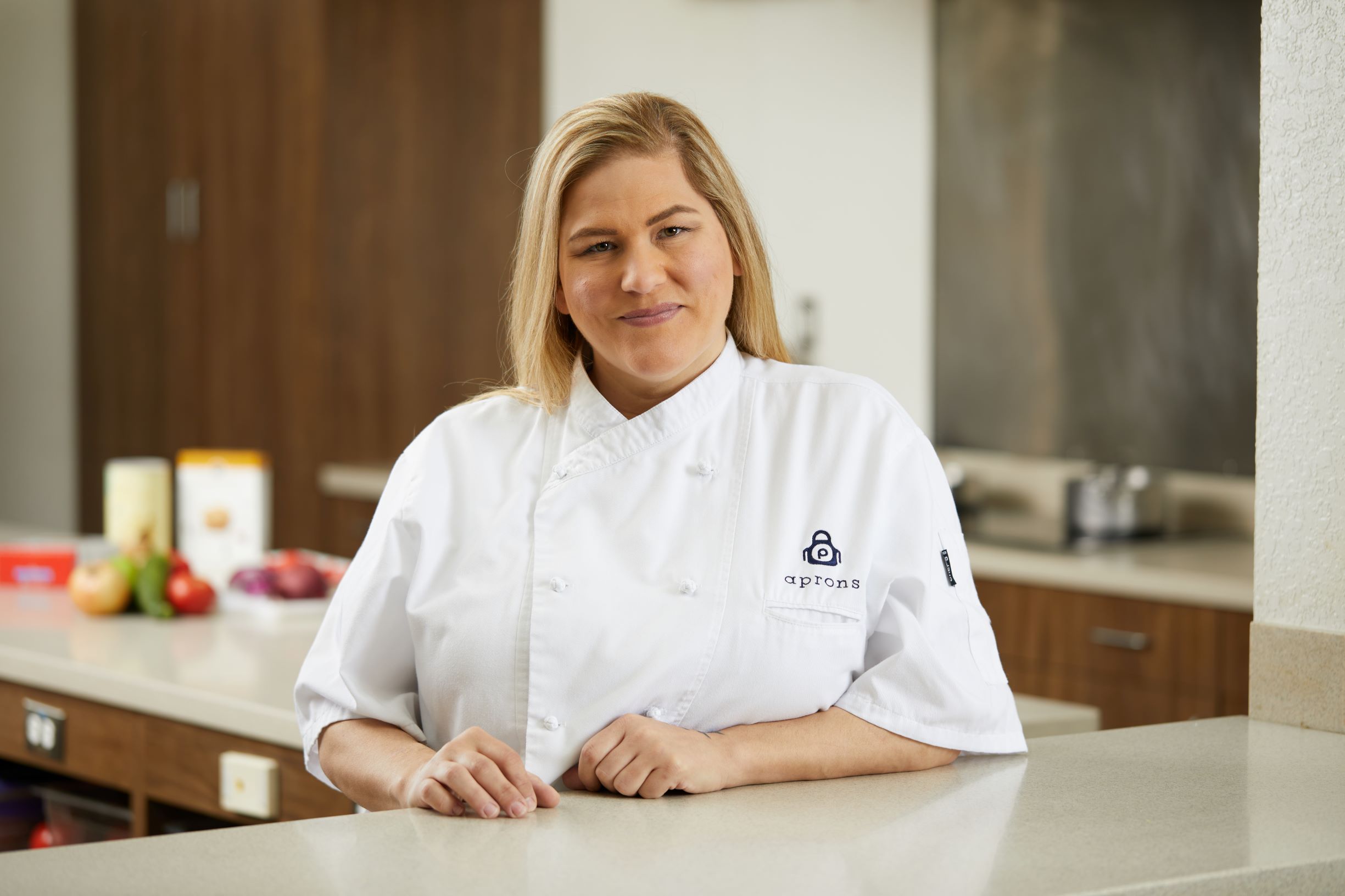 Amber in a chef uniform