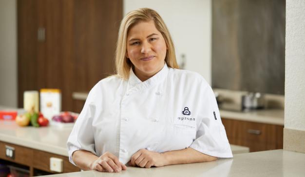 Amber in a chef uniform