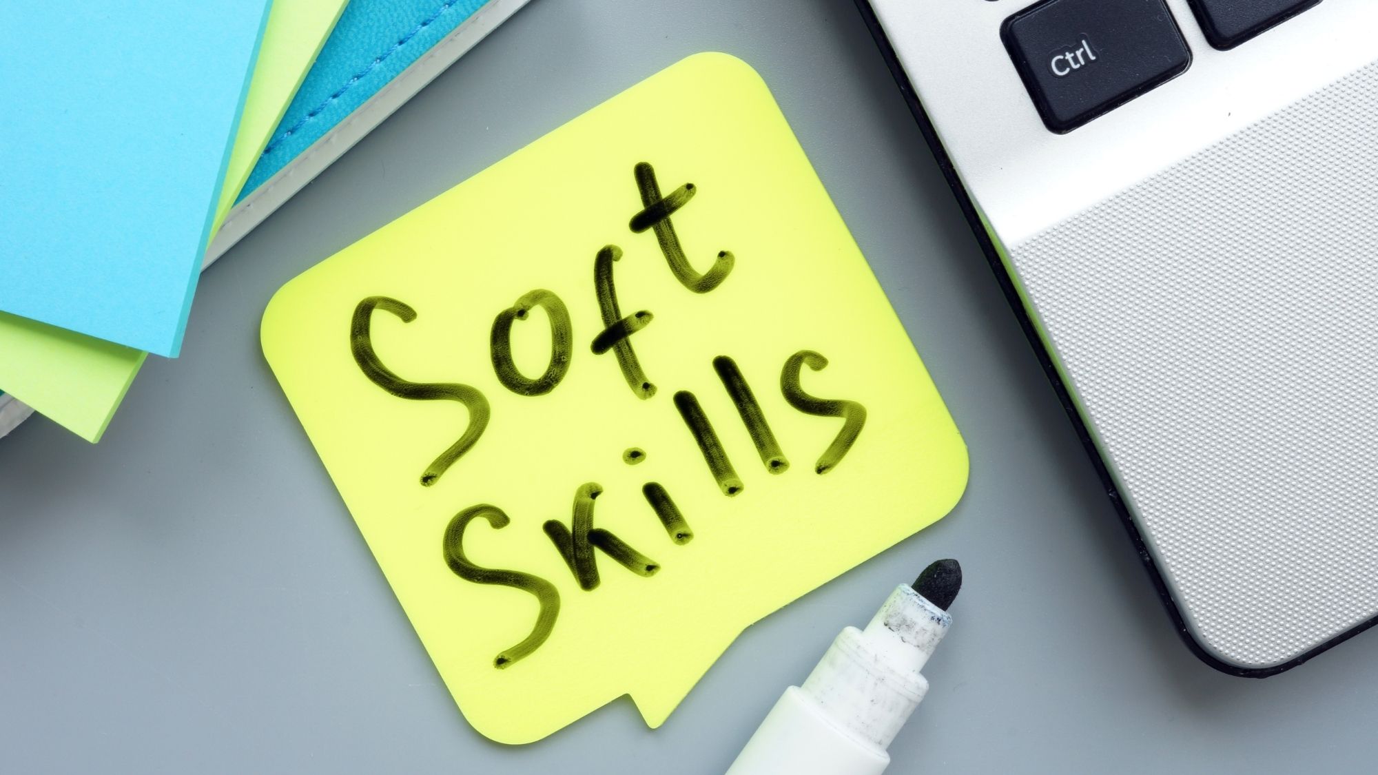 sticky note with soft skills written on it