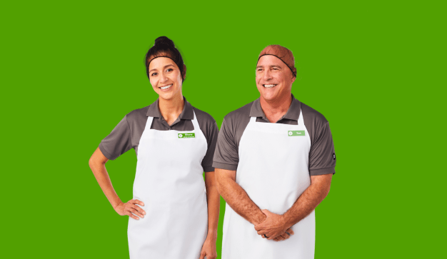 Publix associates in uniforms and aprons