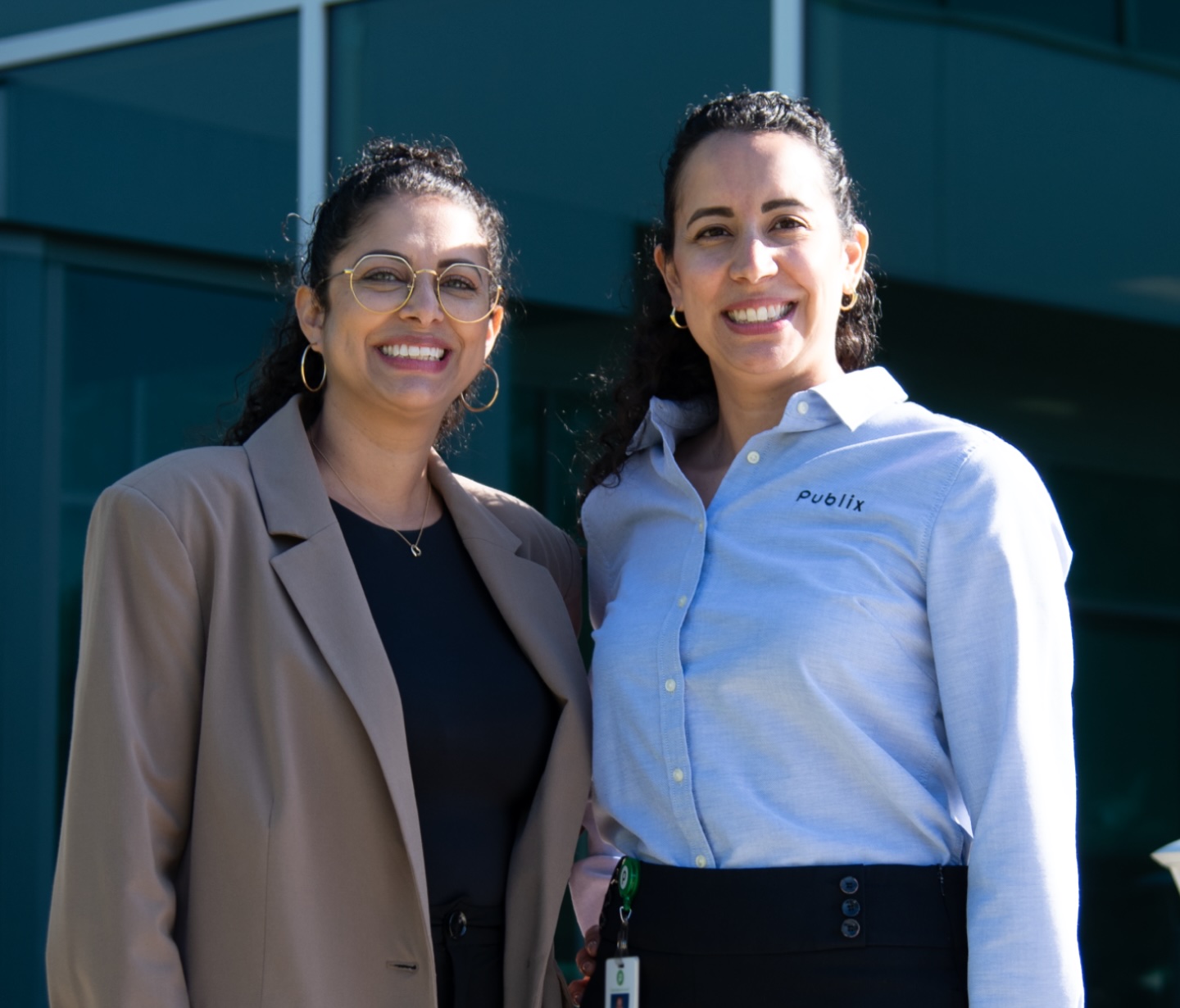 Amy and Nataly in front of the corporate office