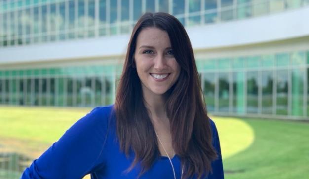 headshot of Michaela in front of the Publix corporate office