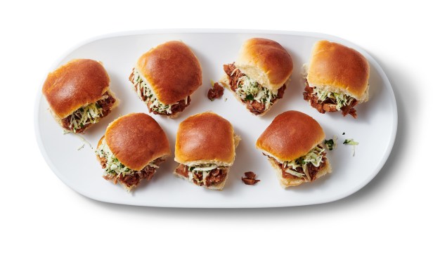 tray holding 7 sliders with golden-brown buns