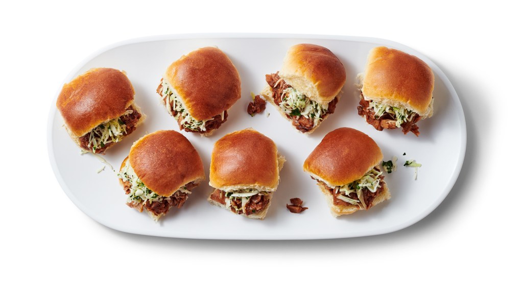 tray holding 7 sliders with golden-brown buns