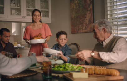family gathering around dinner table