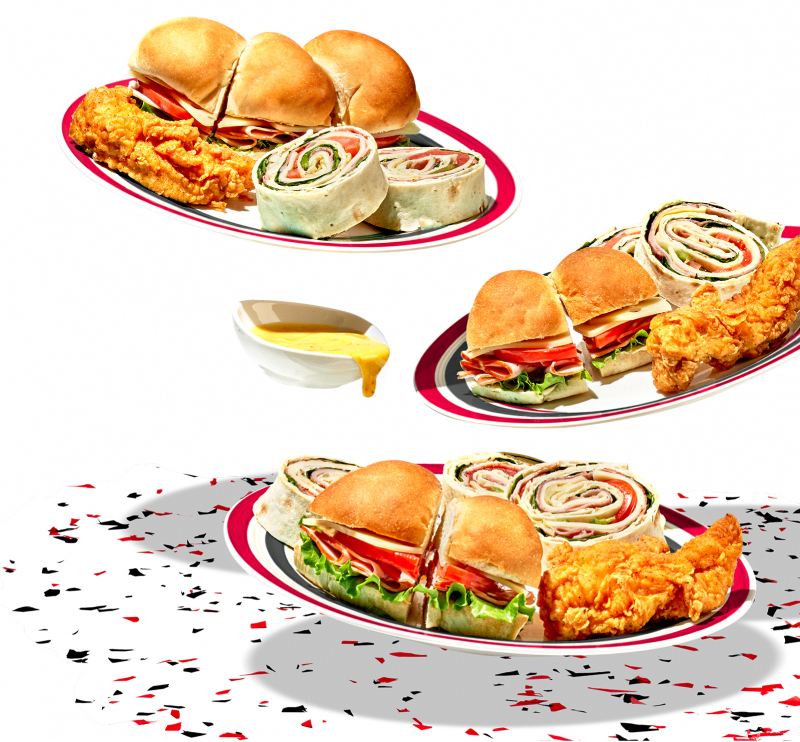 Plates of chicken tenders, pinwheel sandwiches, and deli sandwiches